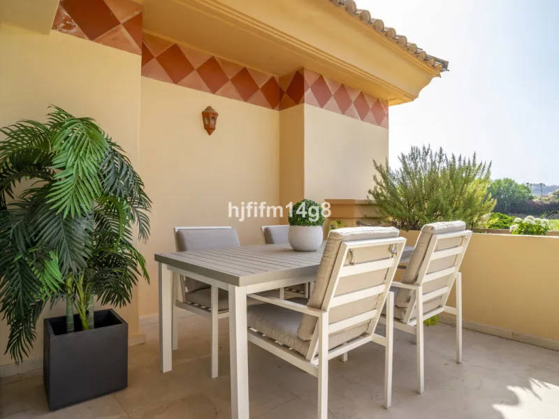 Welcome to this bright and spacious 2-bedroom penthouse in the sought-after Lorcrigolf community, perfectly positioned next to the golf course and offering spectacular views of La Concha Mountain.