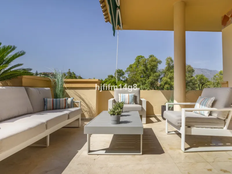 Welcome to this bright and spacious 2-bedroom penthouse in the sought-after Lorcrigolf community, perfectly positioned next to the golf course and offering spectacular views of La Concha Mountain.
