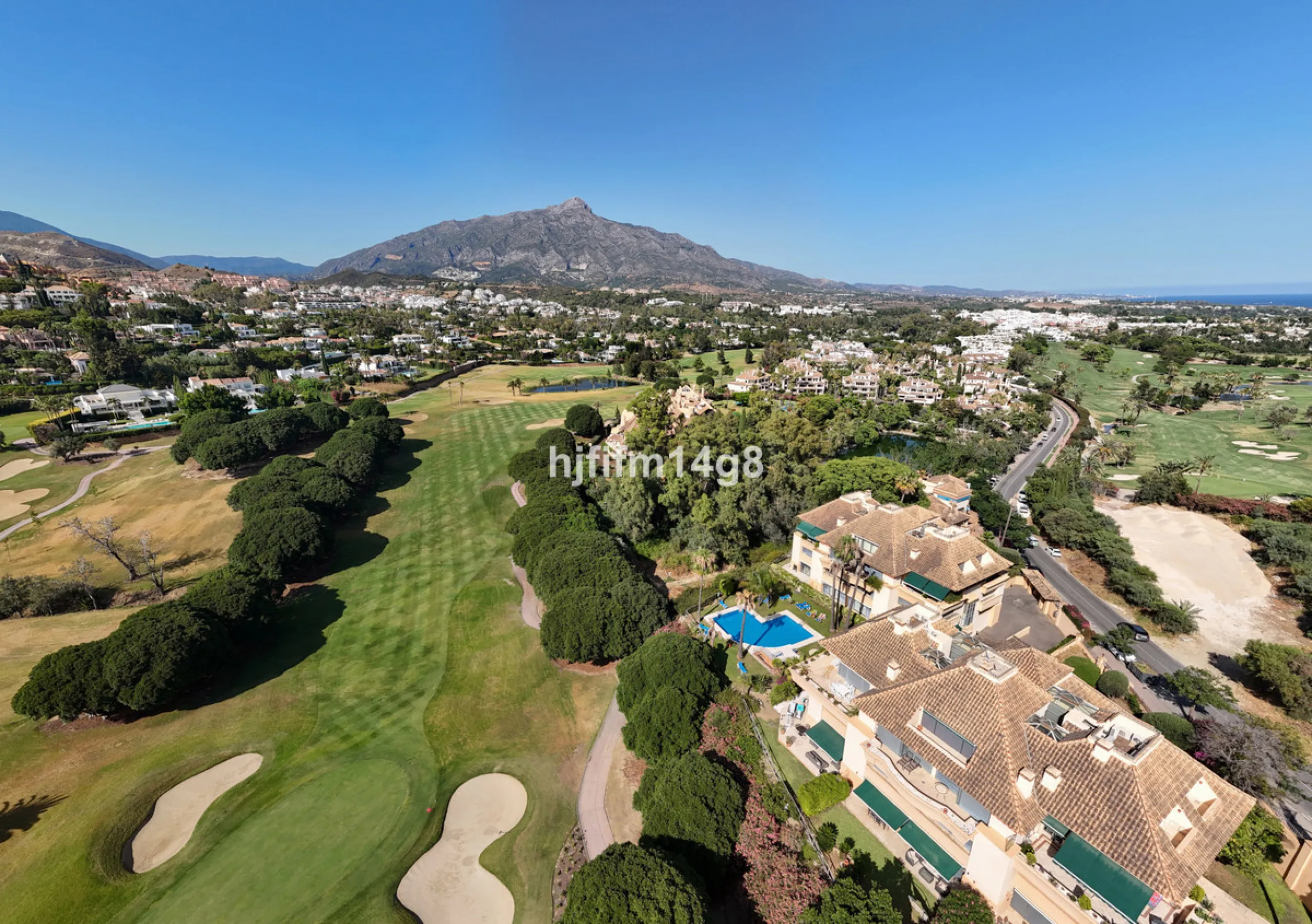 Welcome to this bright and spacious 2-bedroom penthouse in the sought-after Lorcrigolf community, perfectly positioned next to the golf course and offering spectacular views of La Concha Mountain.