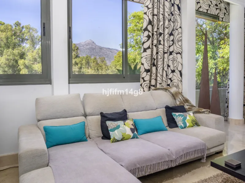 Welcome to this bright and spacious 2-bedroom penthouse in the sought-after Lorcrigolf community, perfectly positioned next to the golf course and offering spectacular views of La Concha Mountain.