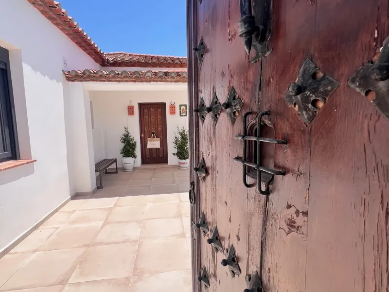 A rare gem on the New Golden Mile! This beautifully renovated finca combines the charm of country living with the convenience of being just a short stroll from the beach. Featuring 3 spacious bedrooms, each with its own ensuite bathroom, plus a guest toil