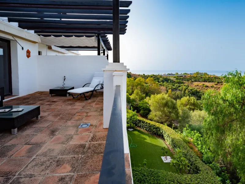 Discover this exquisite duplex penthouse nestled in a charming, white-washed Andalusian village-style urbanisation, found in the heart of Altos de Los Monteros, Marbella.