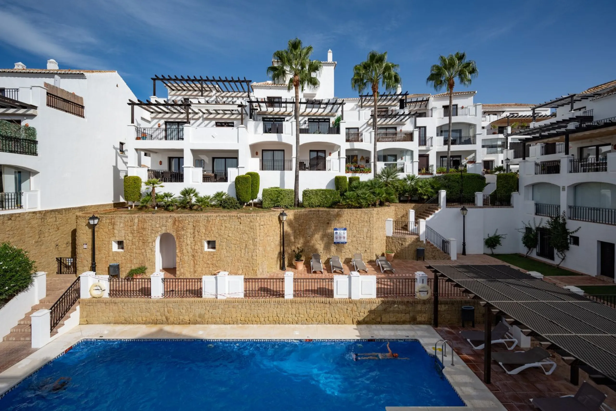 Discover this exquisite duplex penthouse nestled in a charming, white-washed Andalusian village-style urbanisation, found in the heart of Altos de Los Monteros, Marbella.