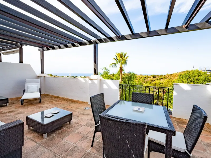 Discover this exquisite duplex penthouse nestled in a charming, white-washed Andalusian village-style urbanisation, found in the heart of Altos de Los Monteros, Marbella.