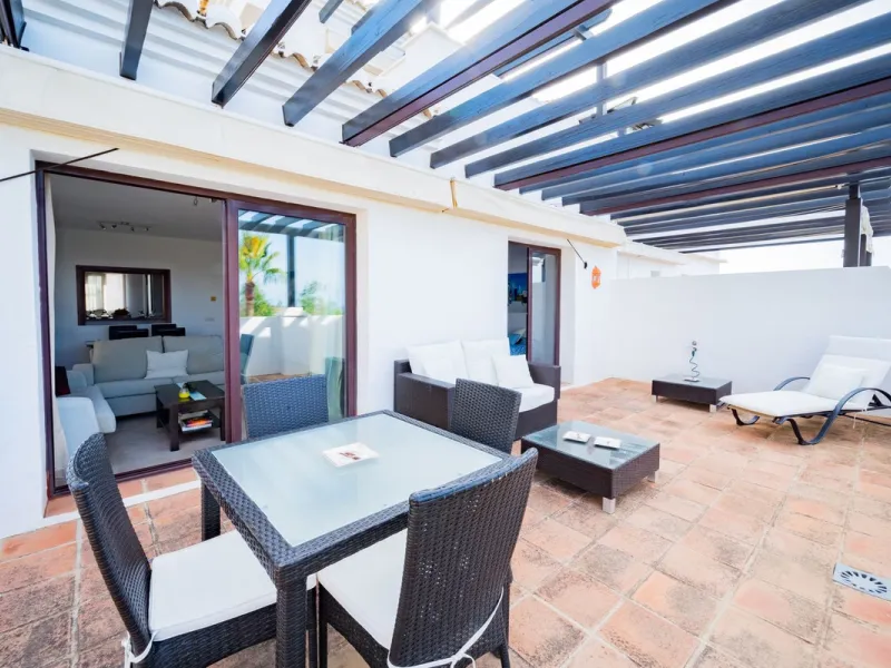 Discover this exquisite duplex penthouse nestled in a charming, white-washed Andalusian village-style urbanisation, found in the heart of Altos de Los Monteros, Marbella.