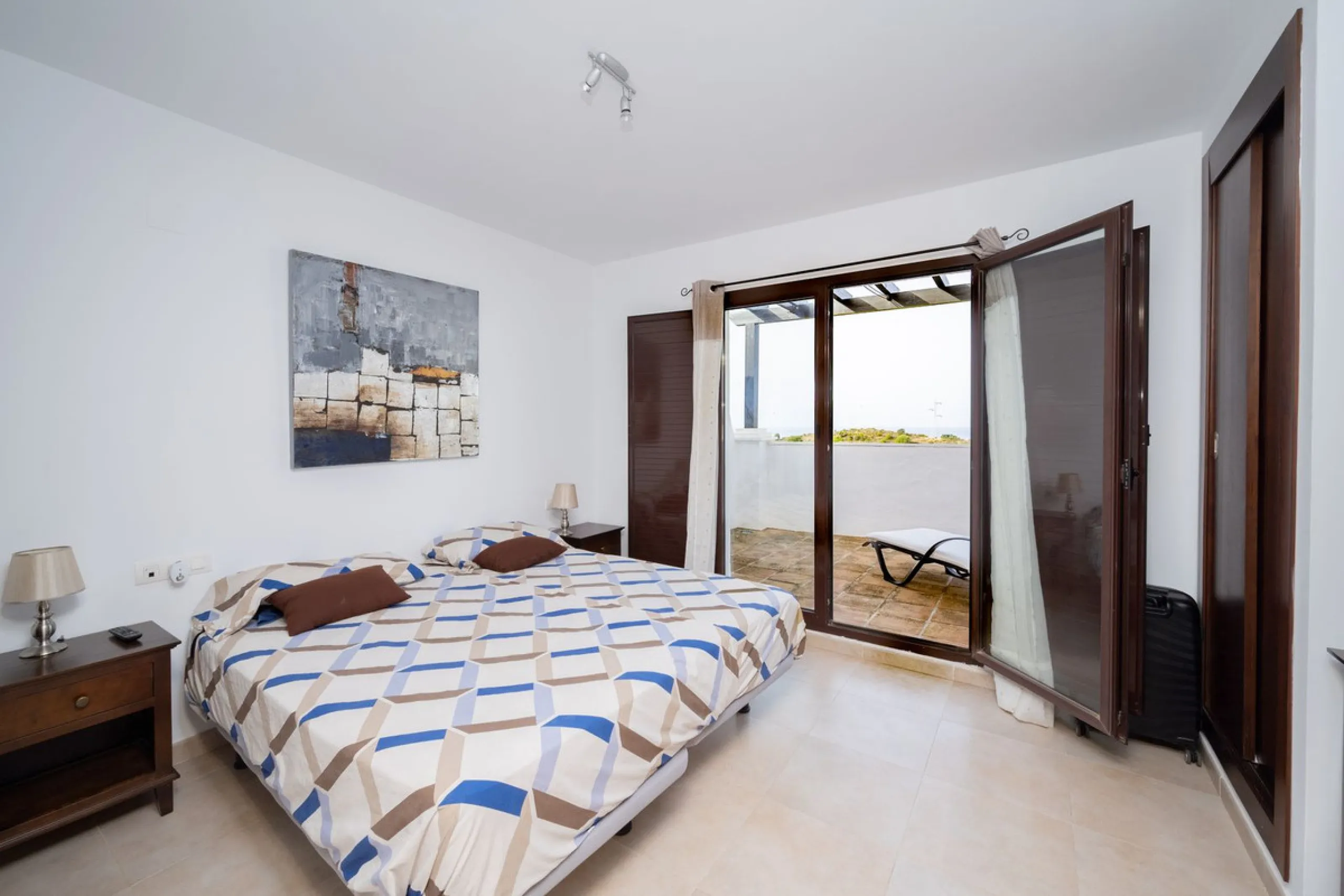 Discover this exquisite duplex penthouse nestled in a charming, white-washed Andalusian village-style urbanisation, found in the heart of Altos de Los Monteros, Marbella.