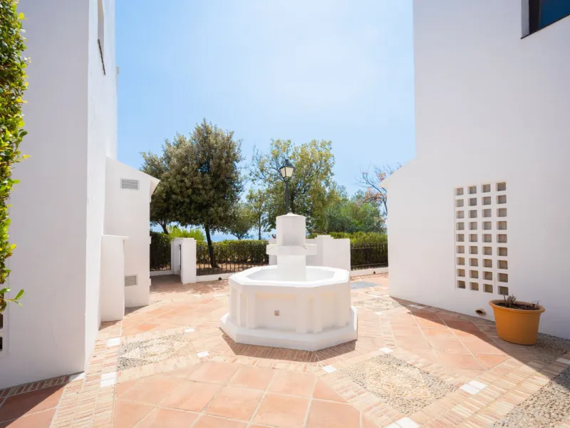 Discover this exquisite duplex penthouse nestled in a charming, white-washed Andalusian village-style urbanisation, found in the heart of Altos de Los Monteros, Marbella.