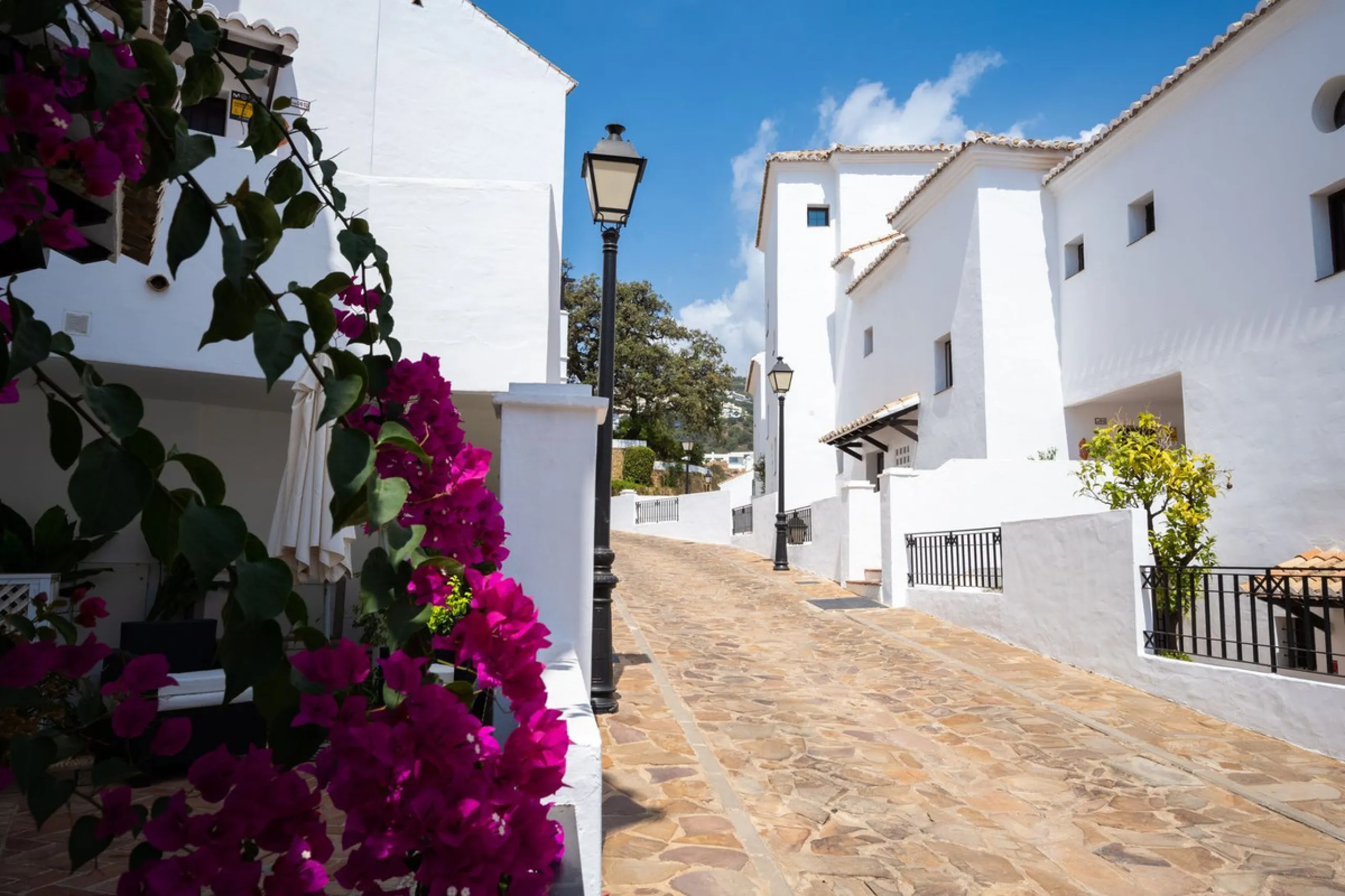 Discover this exquisite duplex penthouse nestled in a charming, white-washed Andalusian village-style urbanisation, found in the heart of Altos de Los Monteros, Marbella.