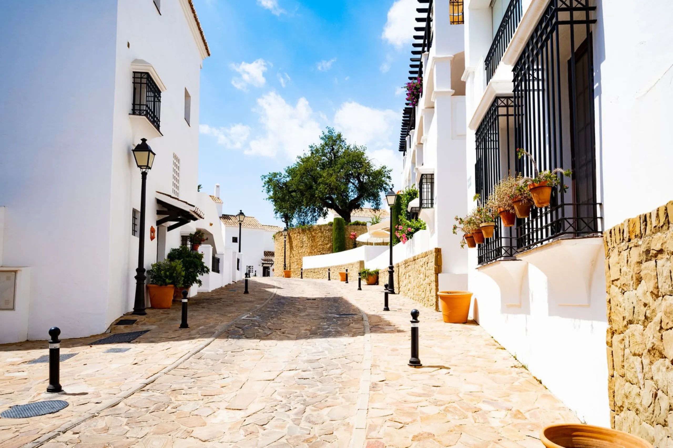 Discover this exquisite duplex penthouse nestled in a charming, white-washed Andalusian village-style urbanisation, found in the heart of Altos de Los Monteros, Marbella.
