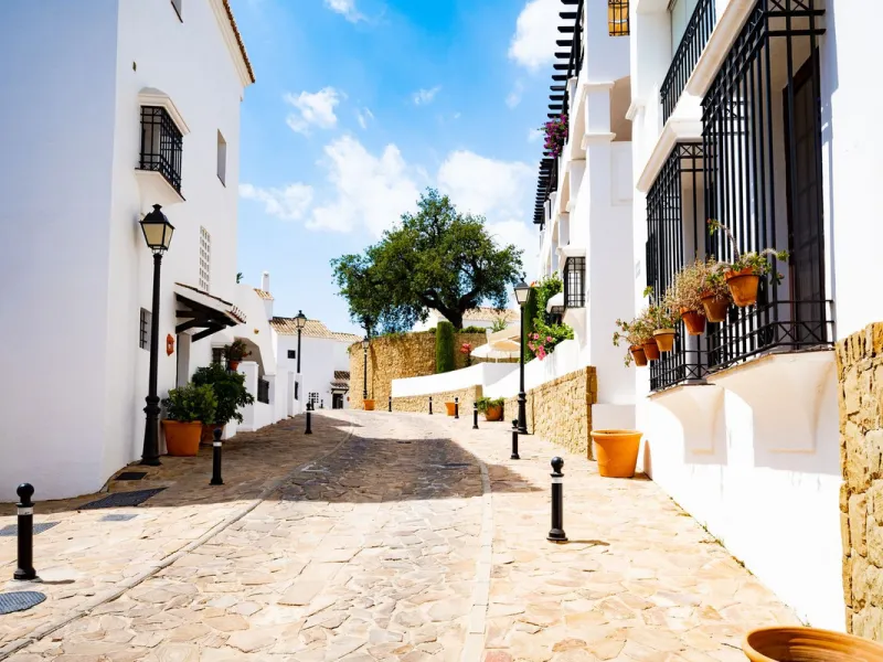Discover this exquisite duplex penthouse nestled in a charming, white-washed Andalusian village-style urbanisation, found in the heart of Altos de Los Monteros, Marbella.