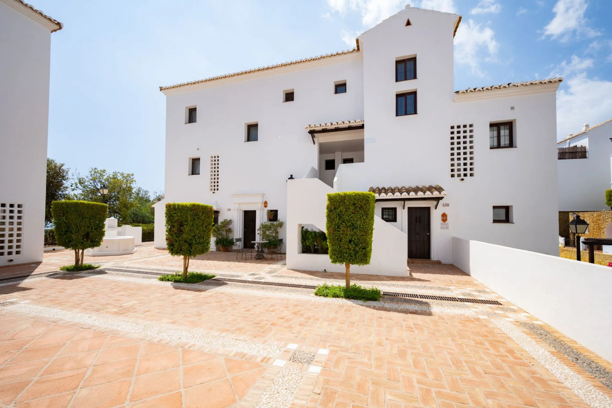 Discover this exquisite duplex penthouse nestled in a charming, white-washed Andalusian village-style urbanisation, found in the heart of Altos de Los Monteros, Marbella.