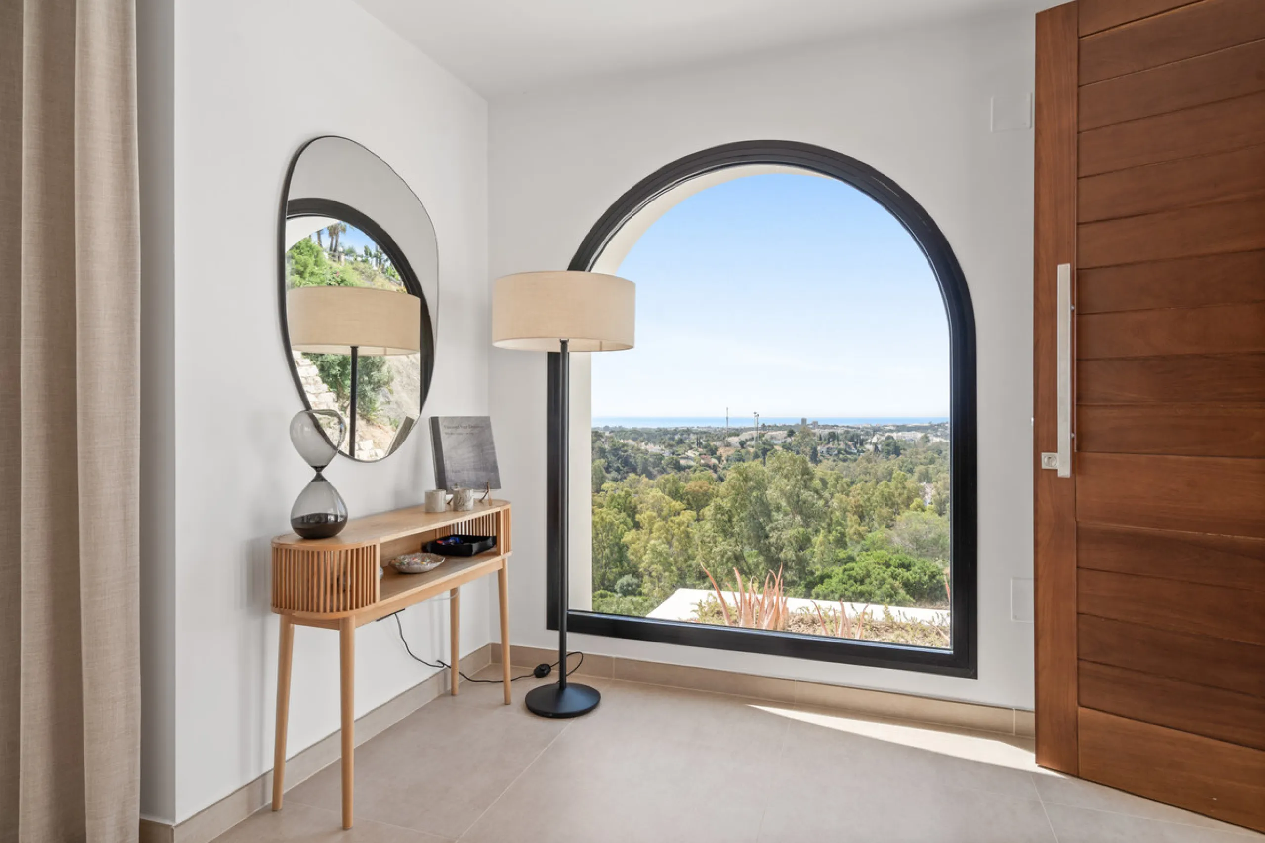 Located in one of Marbella's most sought-after residential areas, this five-bedroom, five-bathroom villa offers panoramic, frontal views of the Mediterranean Sea, La Concha mountain, and Puerto Banús. Positioned on a 1,950 m² plot, the property includes 4