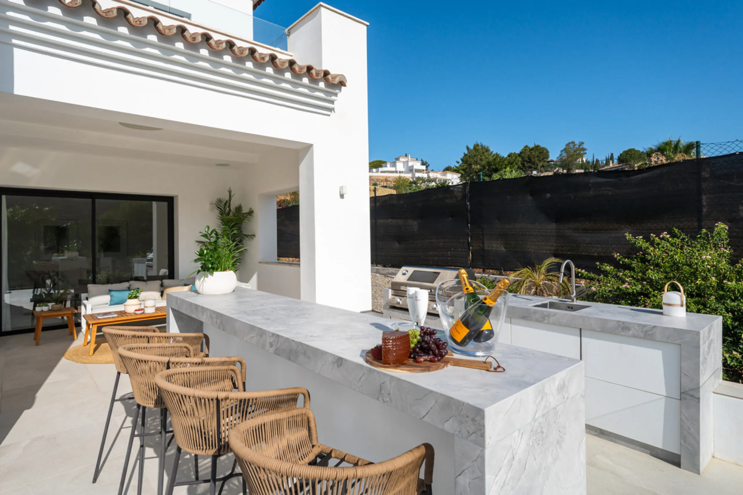 Positioned within the prestigious Santa Maria Golf urbanization in Elviria, Villa Andrea is an extraordinary frontline golf villa for sale in Marbella offering contemporary luxury, seamless design, and a highly desirable setting. Built in 2021 on a genero
