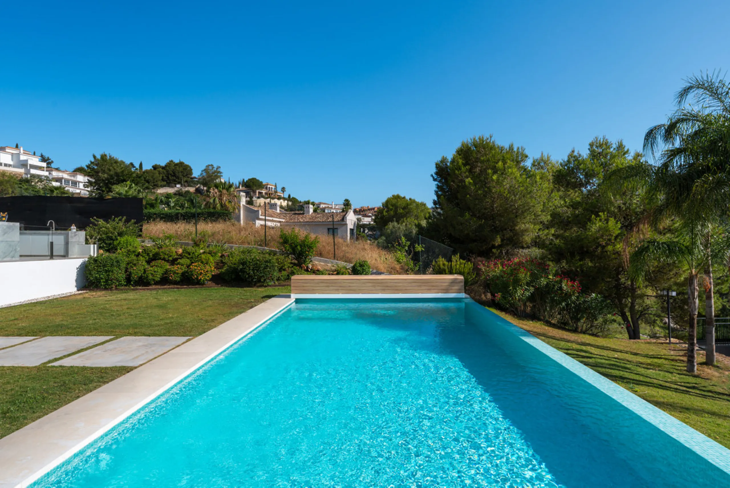 Positioned within the prestigious Santa Maria Golf urbanization in Elviria, Villa Andrea is an extraordinary frontline golf villa for sale in Marbella offering contemporary luxury, seamless design, and a highly desirable setting. Built in 2021 on a genero