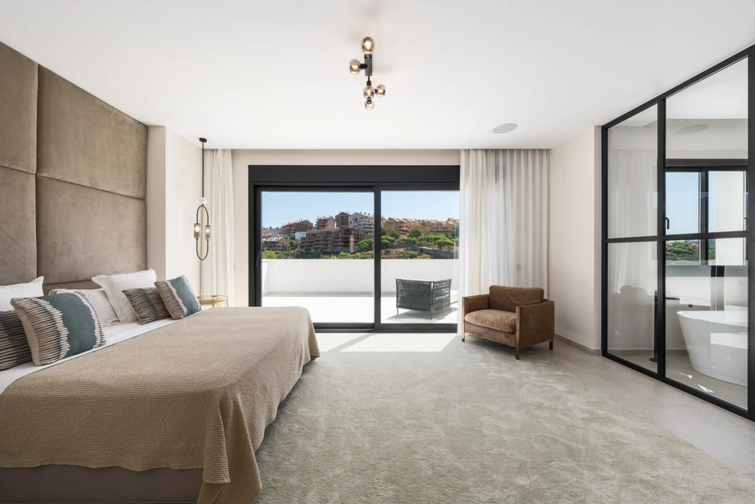 Positioned within the prestigious Santa Maria Golf urbanization in Elviria, Villa Andrea is an extraordinary frontline golf villa for sale in Marbella offering contemporary luxury, seamless design, and a highly desirable setting. Built in 2021 on a genero