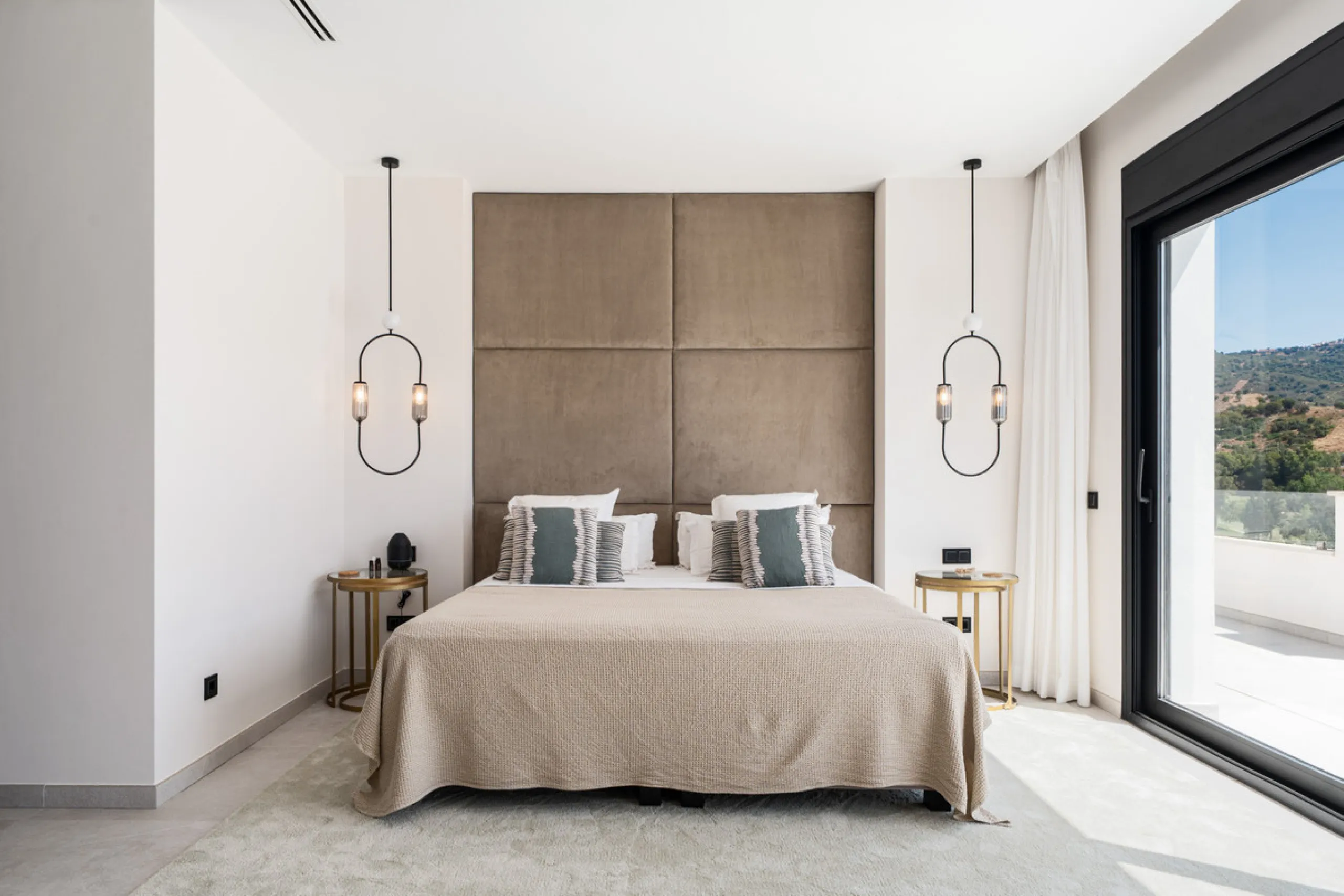 Positioned within the prestigious Santa Maria Golf urbanization in Elviria, Villa Andrea is an extraordinary frontline golf villa for sale in Marbella offering contemporary luxury, seamless design, and a highly desirable setting. Built in 2021 on a genero