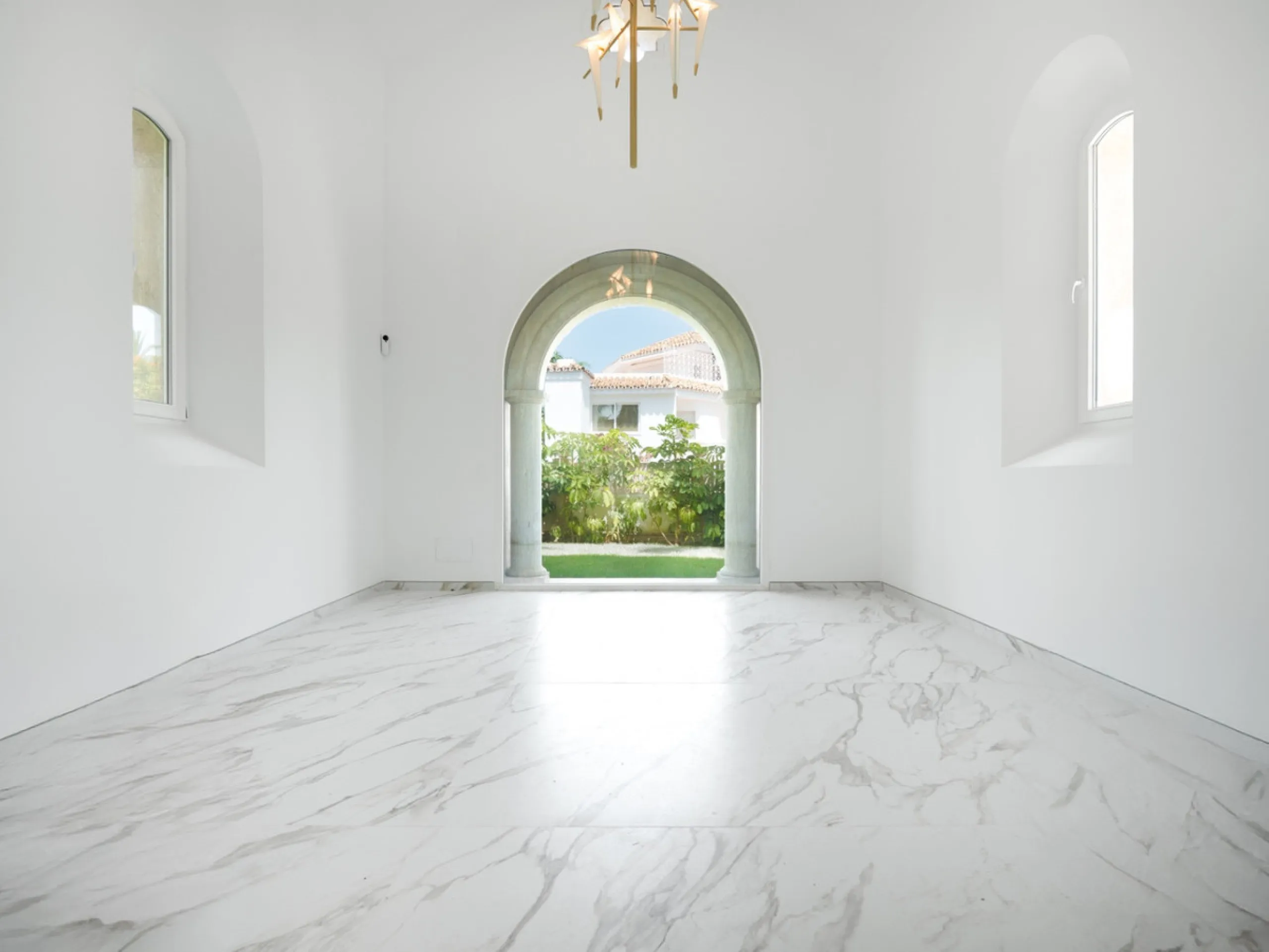 Villa Roma is a stunning four-bedroom, four-bathroom home in the exclusive beachside area of Los Monteros, Marbella East. Just a short walk from the beach, this elegant villa sits on a 933m² plot and combines classic European design with modern coastal co