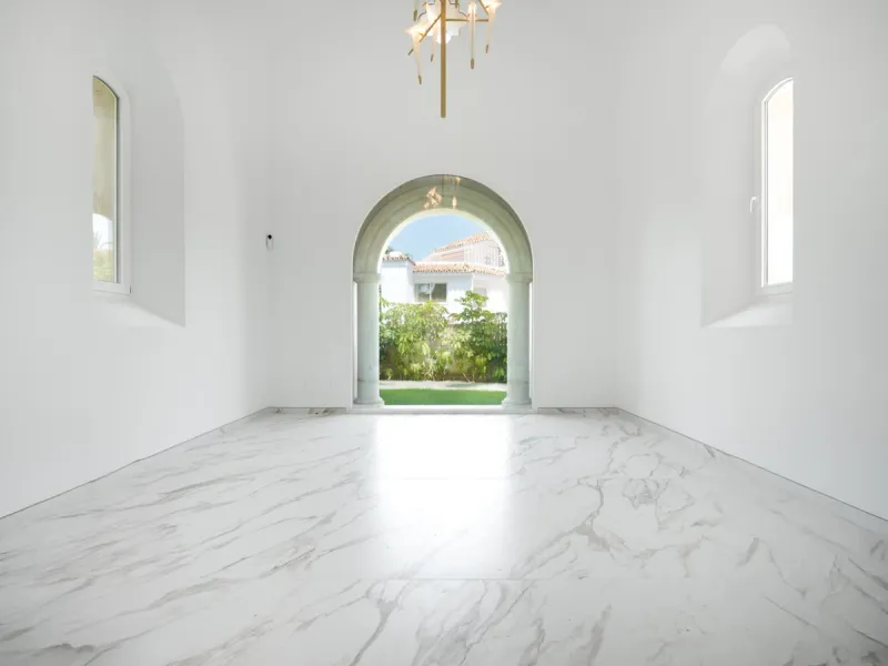 Villa Roma is a stunning four-bedroom, four-bathroom home in the exclusive beachside area of Los Monteros, Marbella East. Just a short walk from the beach, this elegant villa sits on a 933m² plot and combines classic European design with modern coastal co