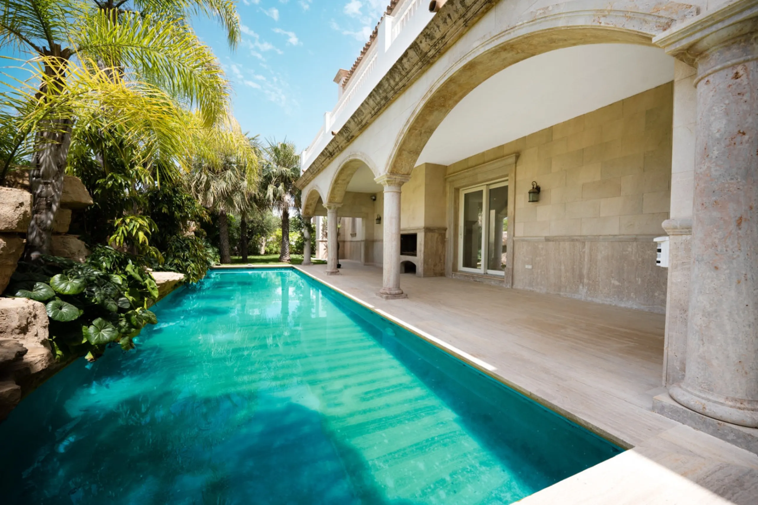 Villa Roma is a stunning four-bedroom, four-bathroom home in the exclusive beachside area of Los Monteros, Marbella East. Just a short walk from the beach, this elegant villa sits on a 933m² plot and combines classic European design with modern coastal co