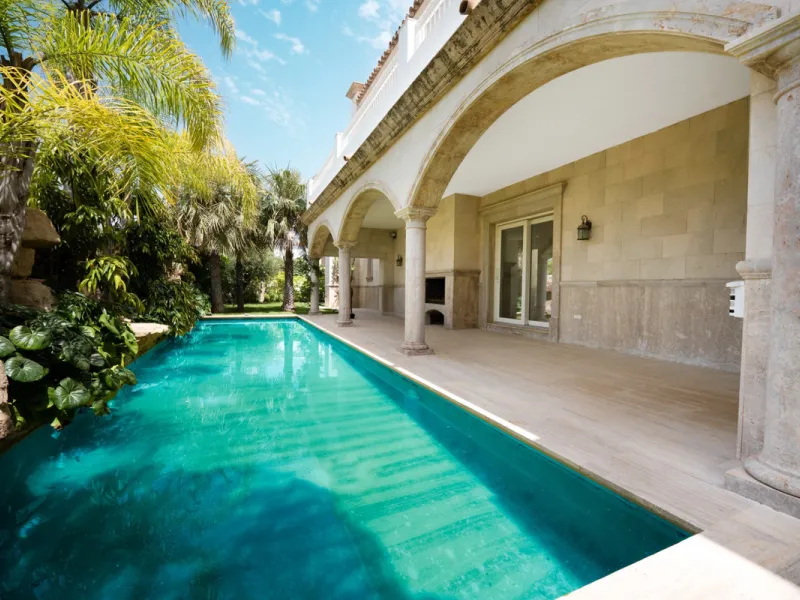 Villa Roma is a stunning four-bedroom, four-bathroom home in the exclusive beachside area of Los Monteros, Marbella East. Just a short walk from the beach, this elegant villa sits on a 933m² plot and combines classic European design with modern coastal co