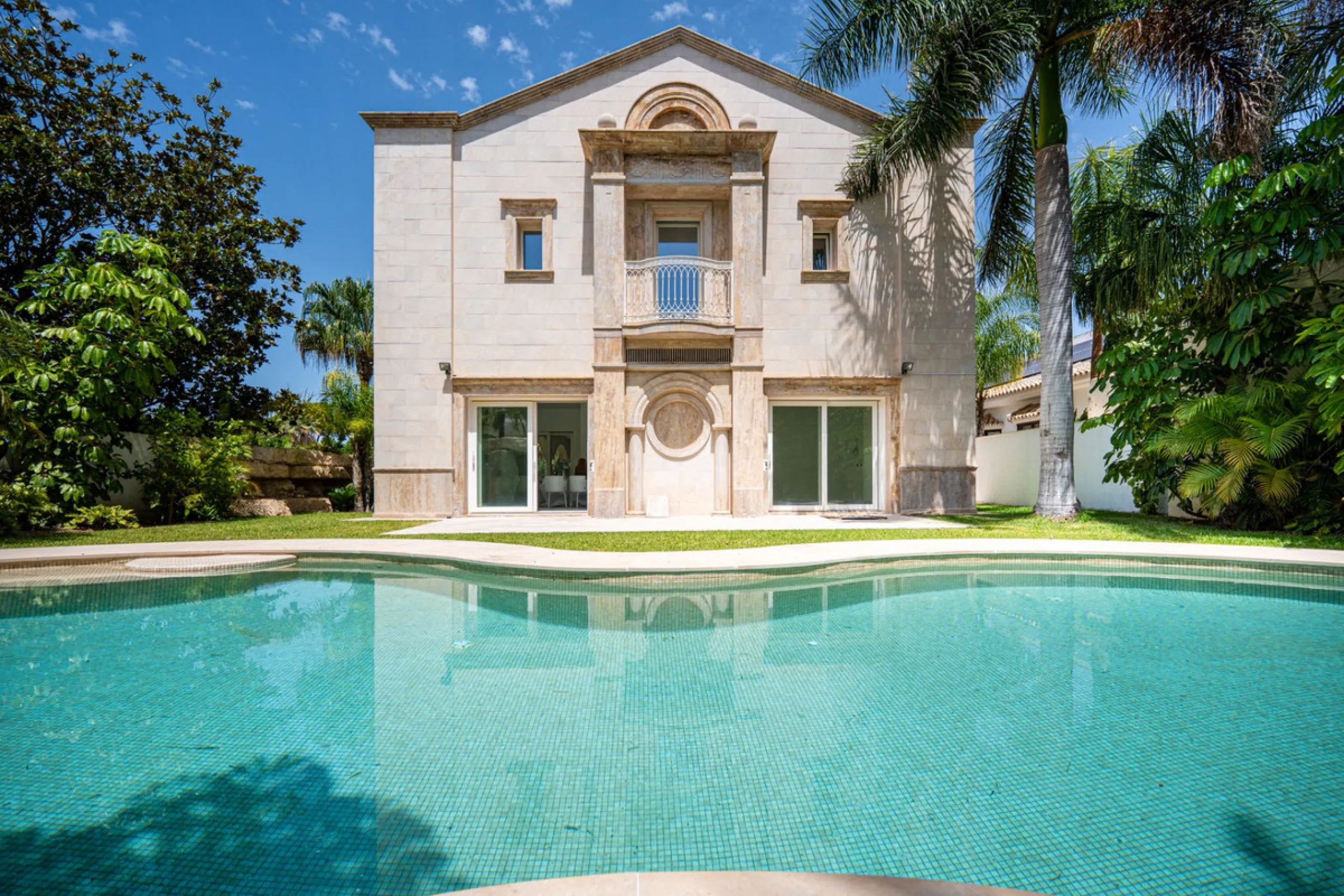 Villa Roma is a stunning four-bedroom, four-bathroom home in the exclusive beachside area of Los Monteros, Marbella East. Just a short walk from the beach, this elegant villa sits on a 933m² plot and combines classic European design with modern coastal co