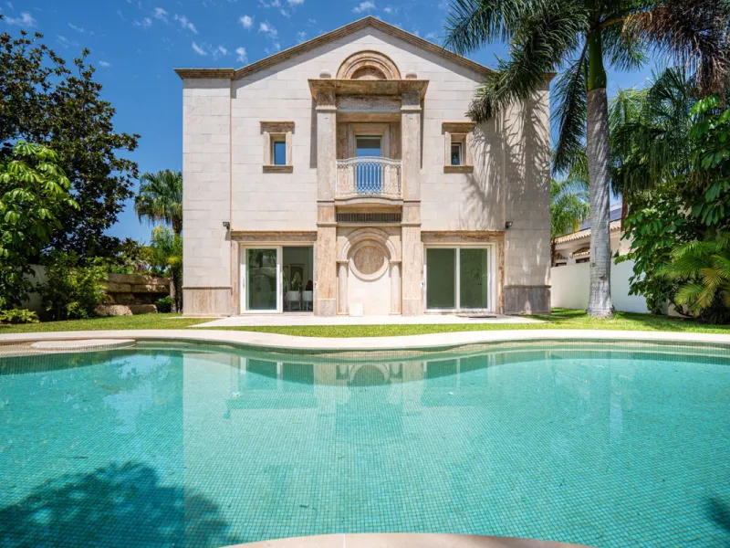 Villa Roma is a stunning four-bedroom, four-bathroom home in the exclusive beachside area of Los Monteros, Marbella East. Just a short walk from the beach, this elegant villa sits on a 933m² plot and combines classic European design with modern coastal co