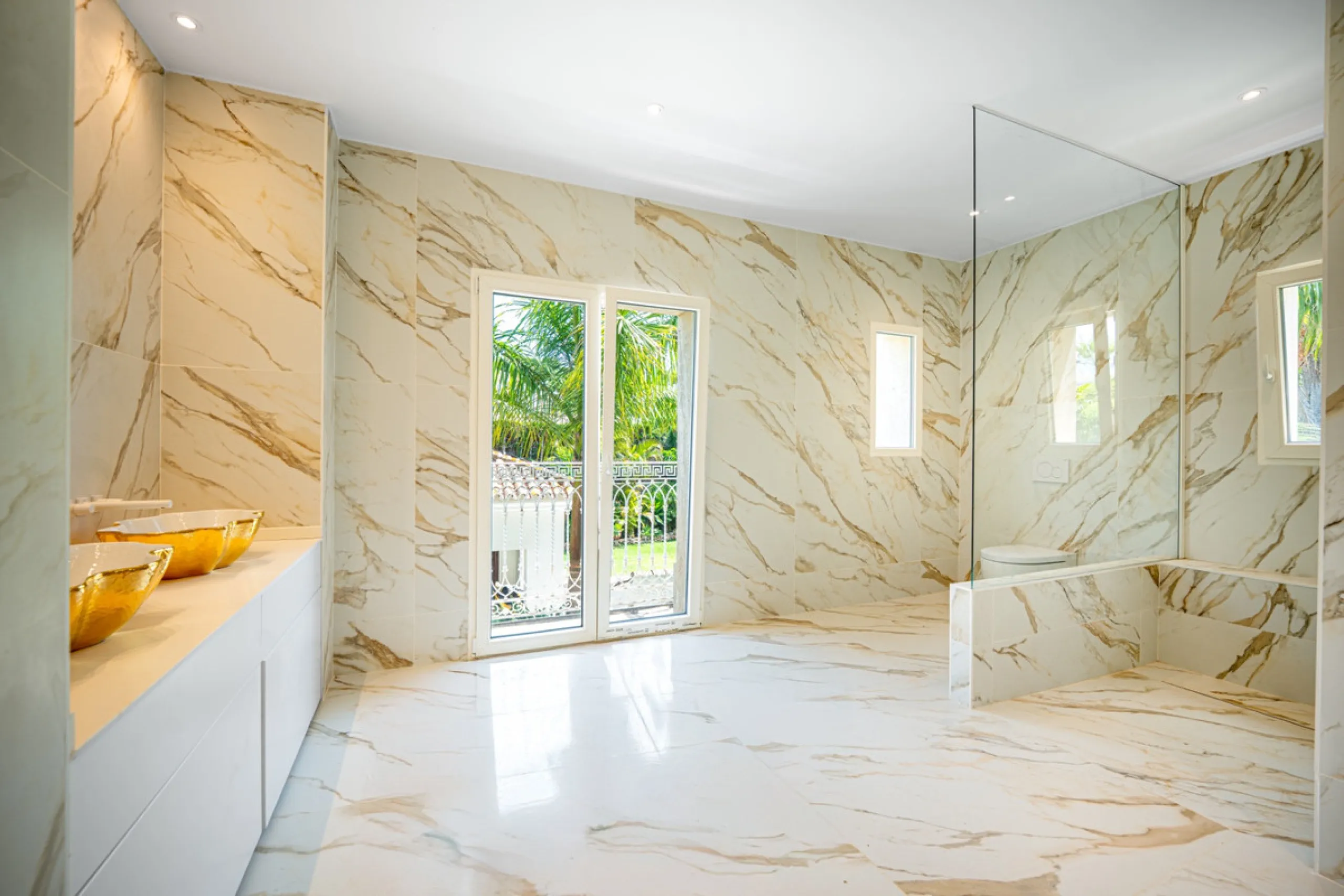 Villa Roma is a stunning four-bedroom, four-bathroom home in the exclusive beachside area of Los Monteros, Marbella East. Just a short walk from the beach, this elegant villa sits on a 933m² plot and combines classic European design with modern coastal co