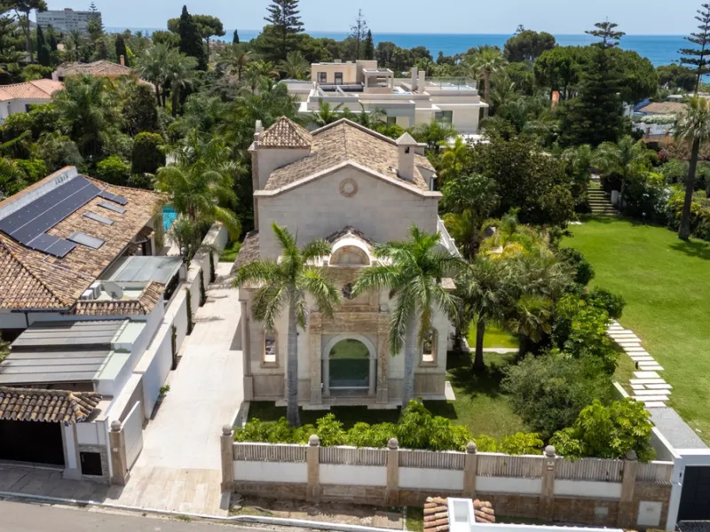 Villa Roma is a stunning four-bedroom, four-bathroom home in the exclusive beachside area of Los Monteros, Marbella East. Just a short walk from the beach, this elegant villa sits on a 933m² plot and combines classic European design with modern coastal co