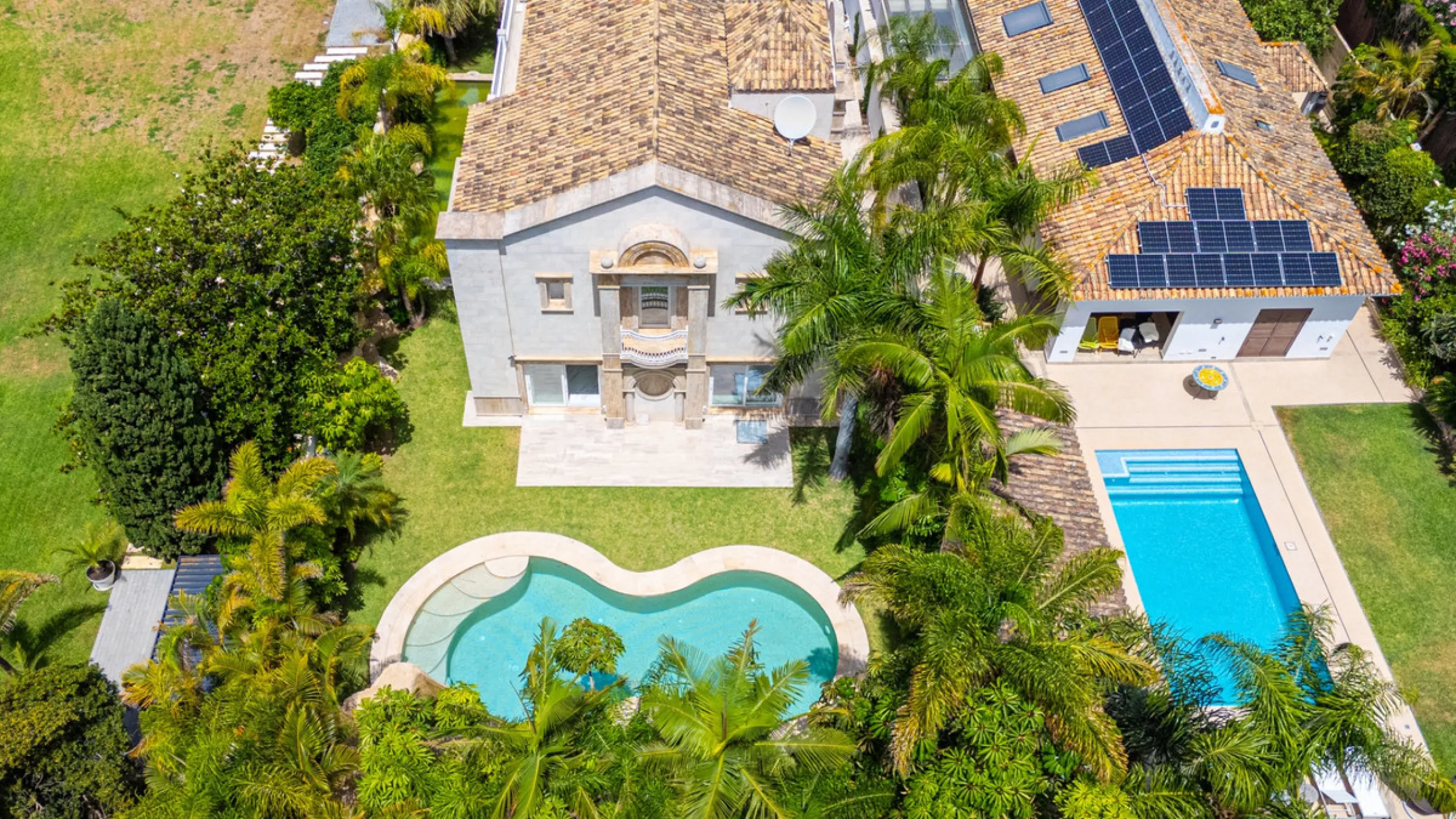 Villa Roma is a stunning four-bedroom, four-bathroom home in the exclusive beachside area of Los Monteros, Marbella East. Just a short walk from the beach, this elegant villa sits on a 933m² plot and combines classic European design with modern coastal co