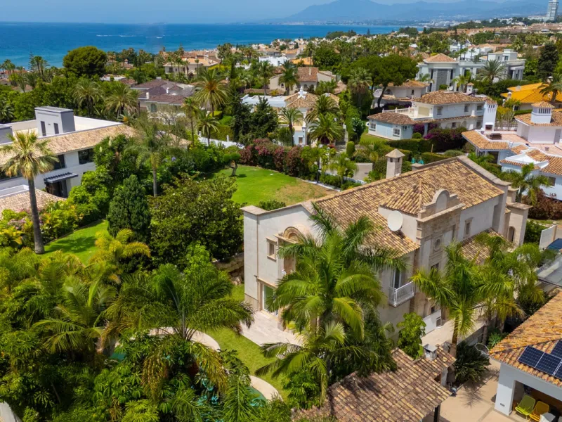 Villa Roma is a stunning four-bedroom, four-bathroom home in the exclusive beachside area of Los Monteros, Marbella East. Just a short walk from the beach, this elegant villa sits on a 933m² plot and combines classic European design with modern coastal co