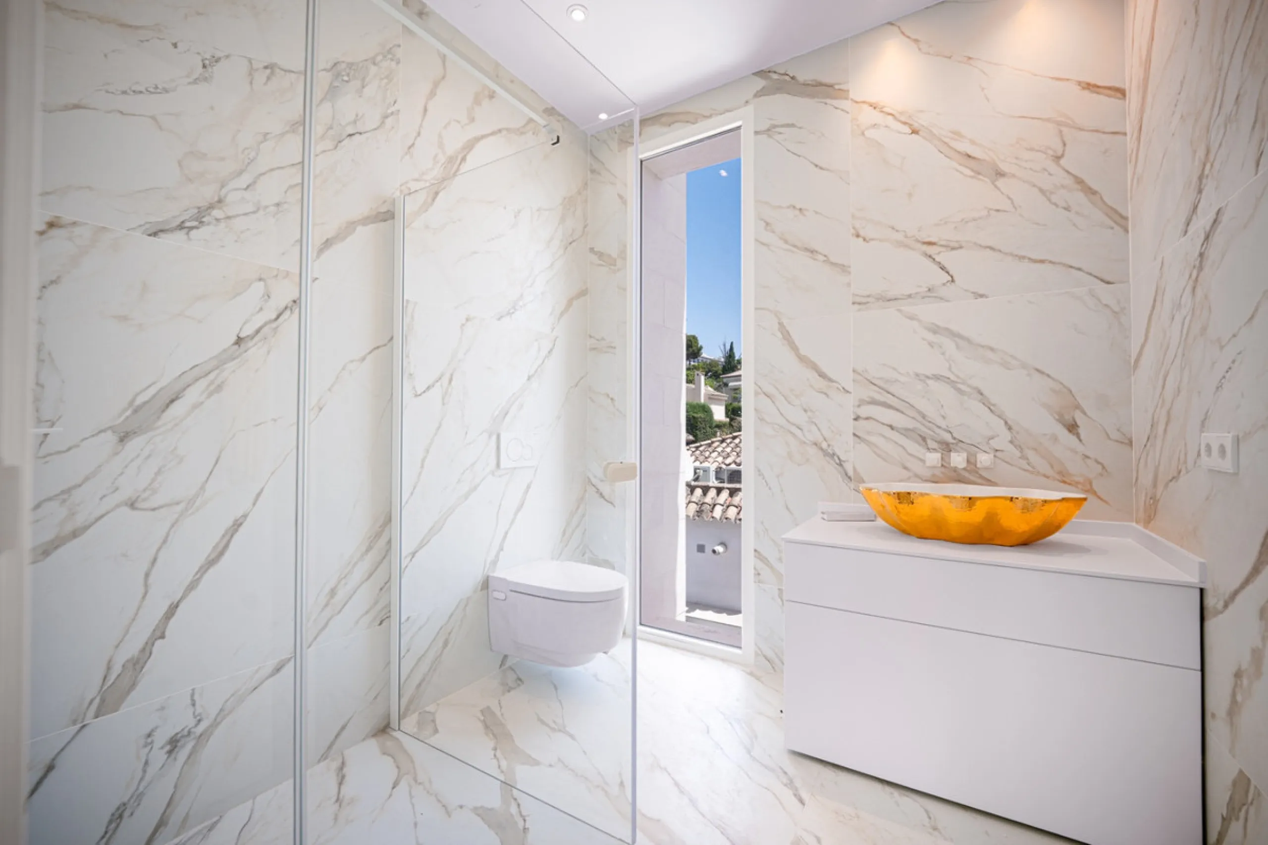 Villa Roma is a stunning four-bedroom, four-bathroom home in the exclusive beachside area of Los Monteros, Marbella East. Just a short walk from the beach, this elegant villa sits on a 933m² plot and combines classic European design with modern coastal co