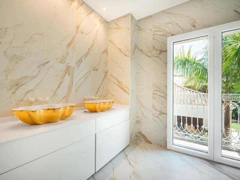 Villa Roma is a stunning four-bedroom, four-bathroom home in the exclusive beachside area of Los Monteros, Marbella East. Just a short walk from the beach, this elegant villa sits on a 933m² plot and combines classic European design with modern coastal co