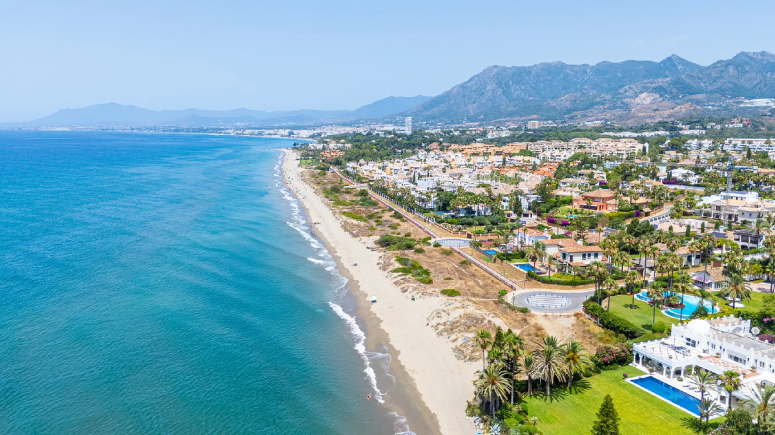 Villa Roma is a stunning four-bedroom, four-bathroom home in the exclusive beachside area of Los Monteros, Marbella East. Just a short walk from the beach, this elegant villa sits on a 933m² plot and combines classic European design with modern coastal co