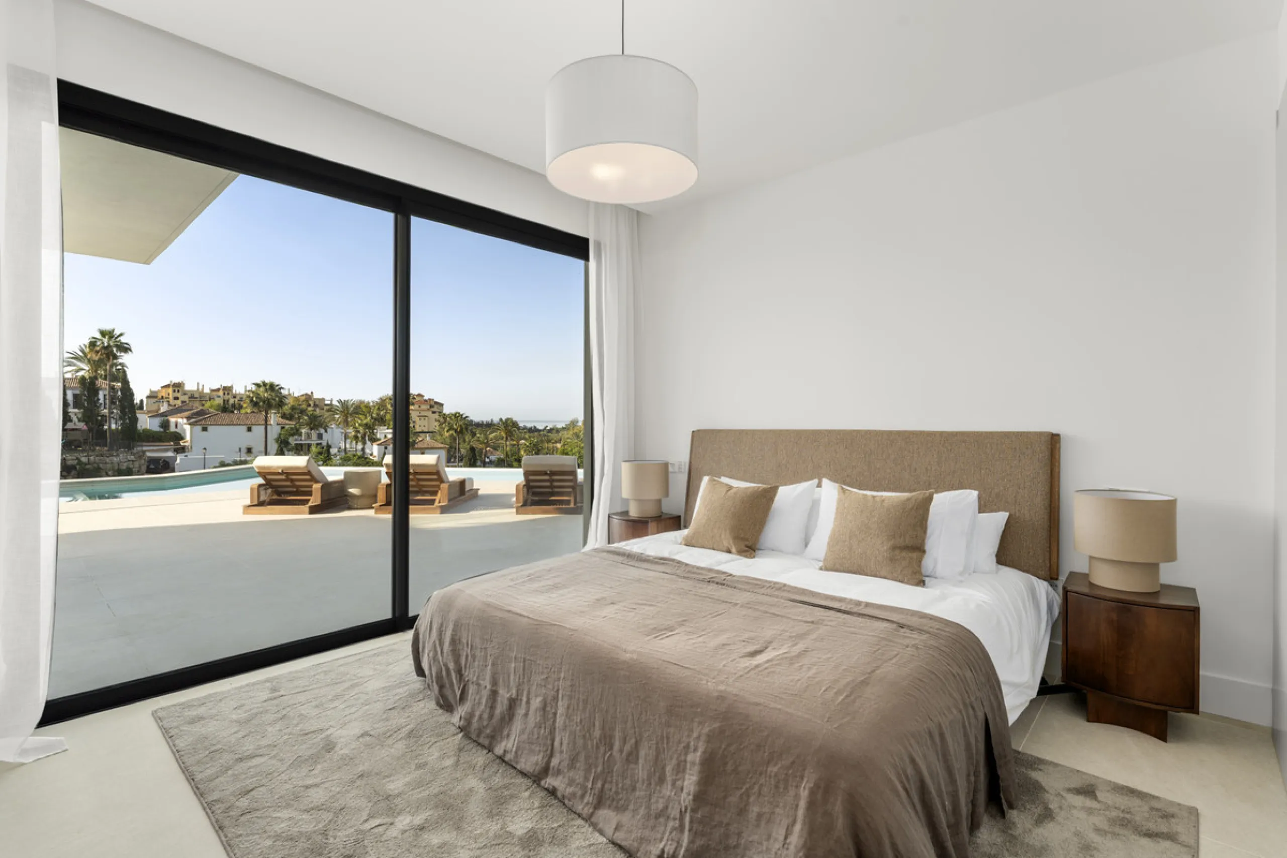 Villa Three, located in the distinguished La Resina Golf community within Estepona's flourishing residential zone, is an architectural statement combining contemporary sophistication and practical luxury. Designed by the acclaimed Francisco Martínez Galvá