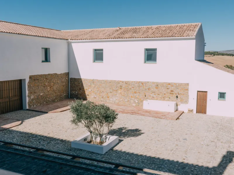 Set on a vast 270,000 m² estate near Ardales and the popular Caminito del Rey, this stunning cortijo blends recent renovations with preserved traditional features—thick stone walls, wooden beams, and classic doors—offering comfort without compromising cha