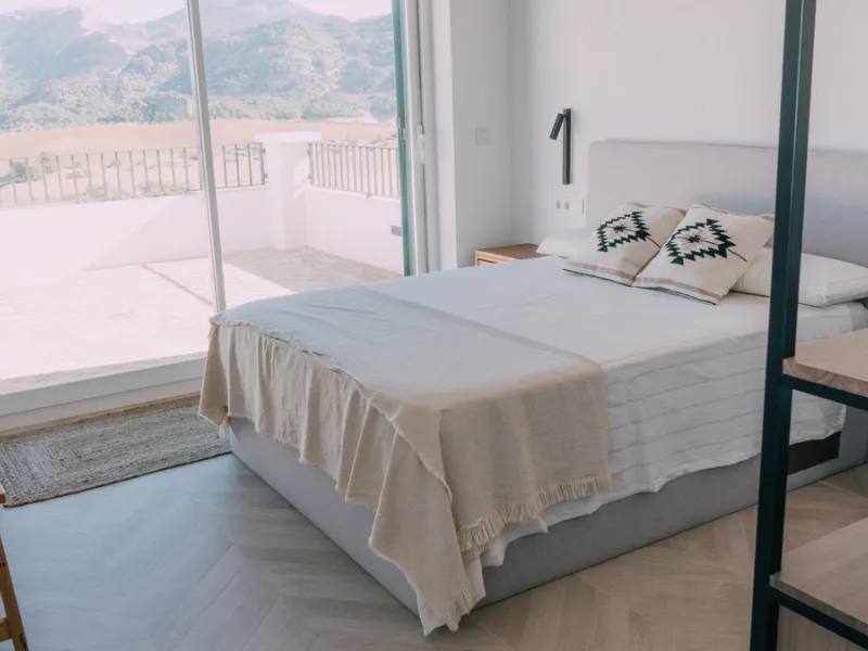 Set on a vast 270,000 m² estate near Ardales and the popular Caminito del Rey, this stunning cortijo blends recent renovations with preserved traditional features—thick stone walls, wooden beams, and classic doors—offering comfort without compromising cha