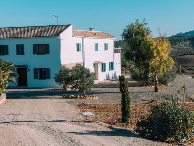 Set on a vast 270,000 m² estate near Ardales and the popular Caminito del Rey, this stunning cortijo blends recent renovations with preserved traditional features—thick stone walls, wooden beams, and classic doors—offering comfort without compromising cha