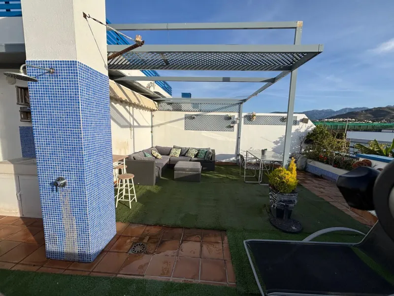 Frontline top floor duplex apartment located on the beach of El Peñoncillo in Torrox-Costa with direct access to the sea.