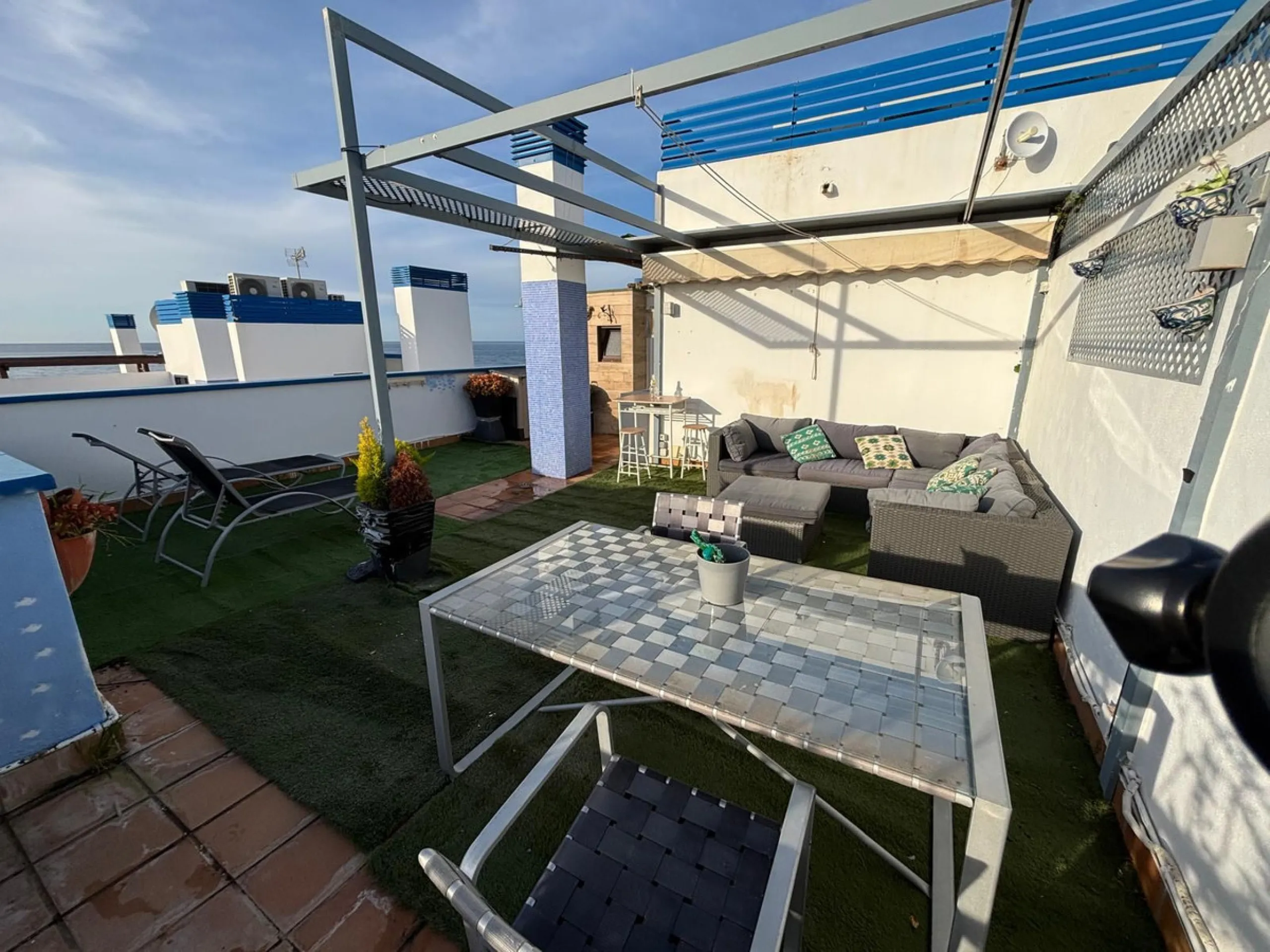 Frontline top floor duplex apartment located on the beach of El Peñoncillo in Torrox-Costa with direct access to the sea.