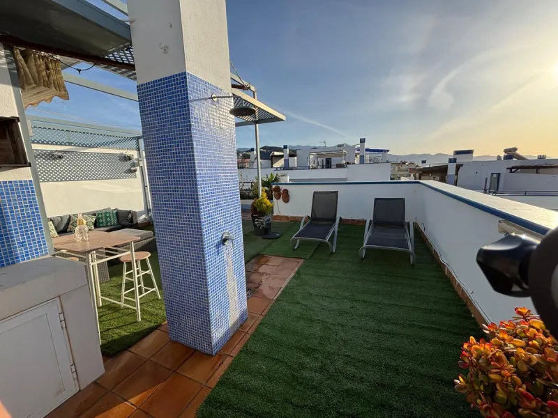 Frontline top floor duplex apartment located on the beach of El Peñoncillo in Torrox-Costa with direct access to the sea.