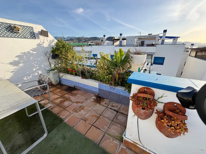 Frontline top floor duplex apartment located on the beach of El Peñoncillo in Torrox-Costa with direct access to the sea.