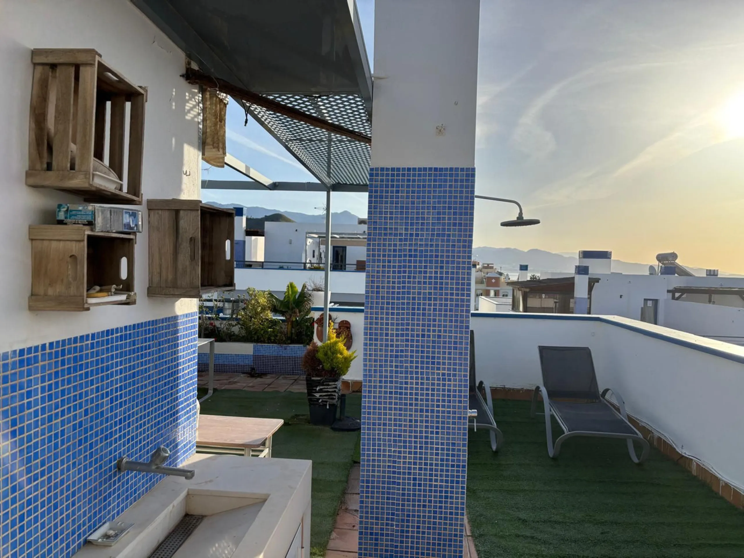 Frontline top floor duplex apartment located on the beach of El Peñoncillo in Torrox-Costa with direct access to the sea.