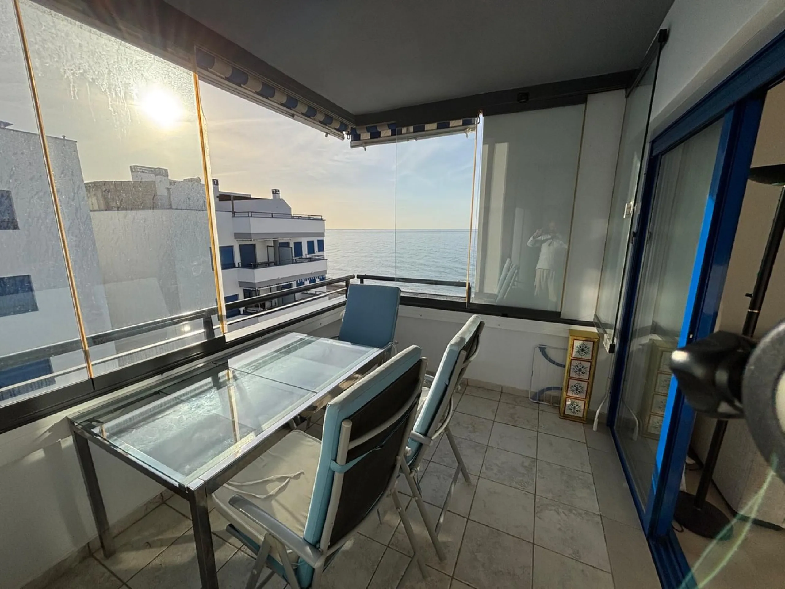 Frontline top floor duplex apartment located on the beach of El Peñoncillo in Torrox-Costa with direct access to the sea.