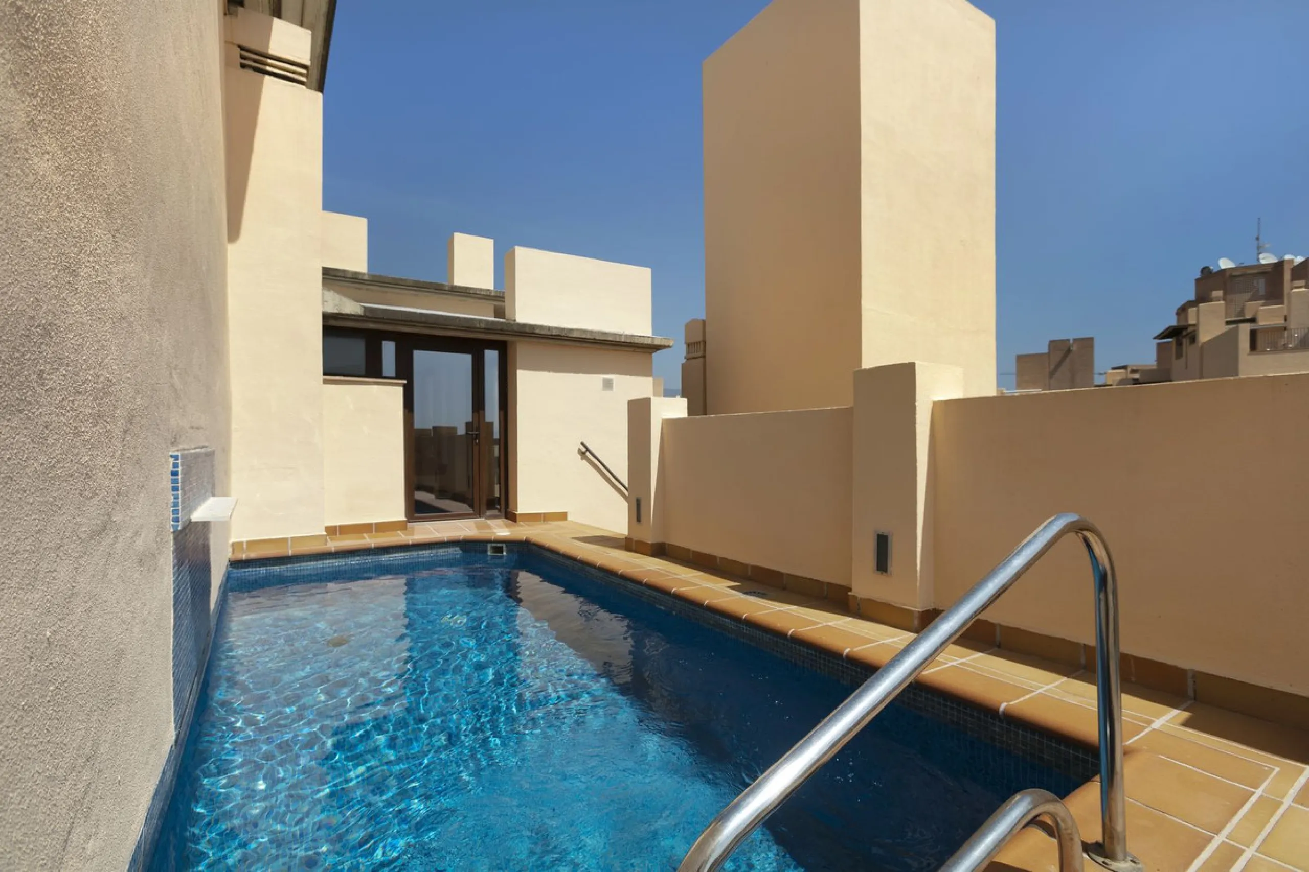 Stunning 3 bed duplex with private rooftop pool located in the exclusive beachfront urbanisation Bahia de la Plata.