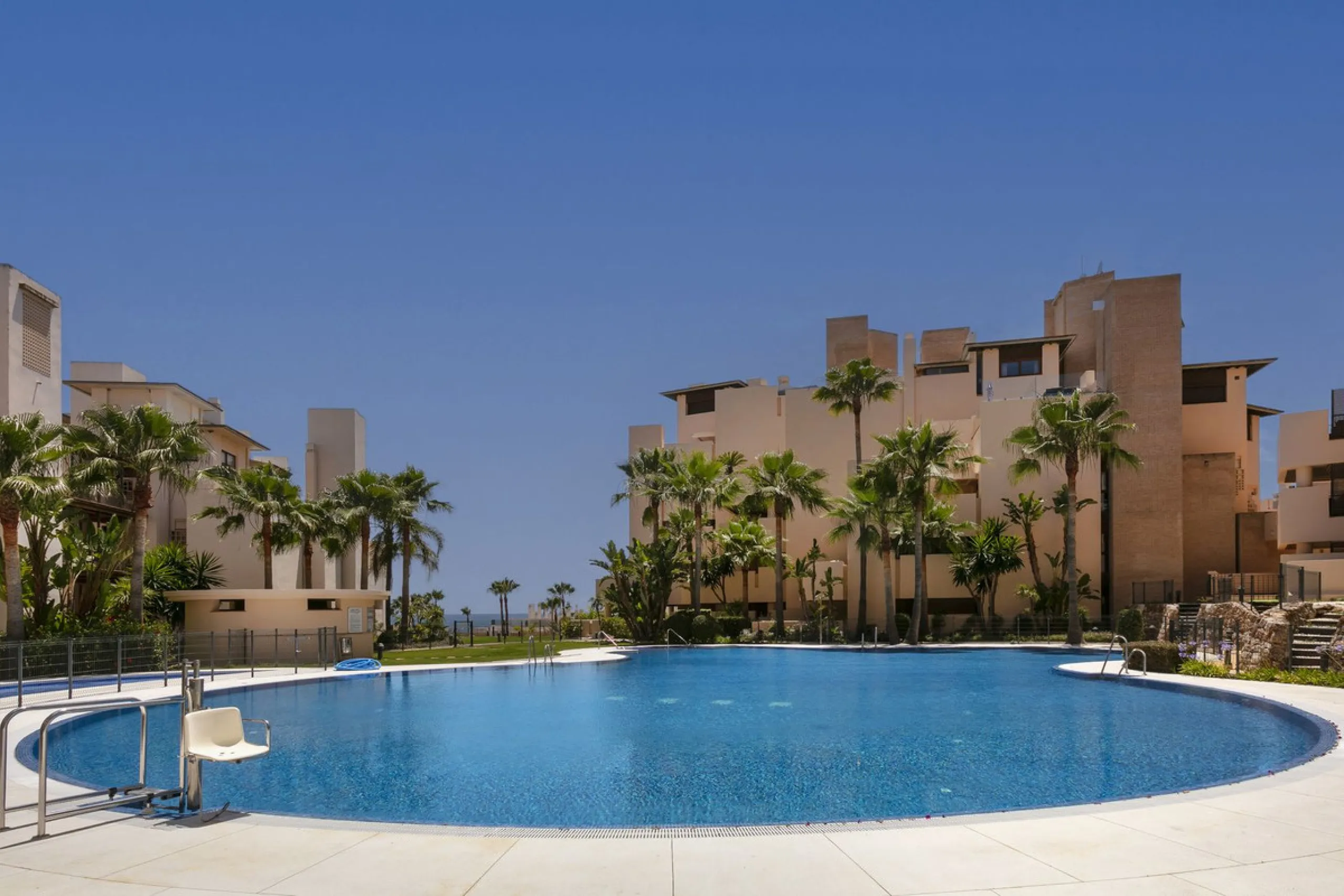 Stunning 3 bed duplex with private rooftop pool located in the exclusive beachfront urbanisation Bahia de la Plata.