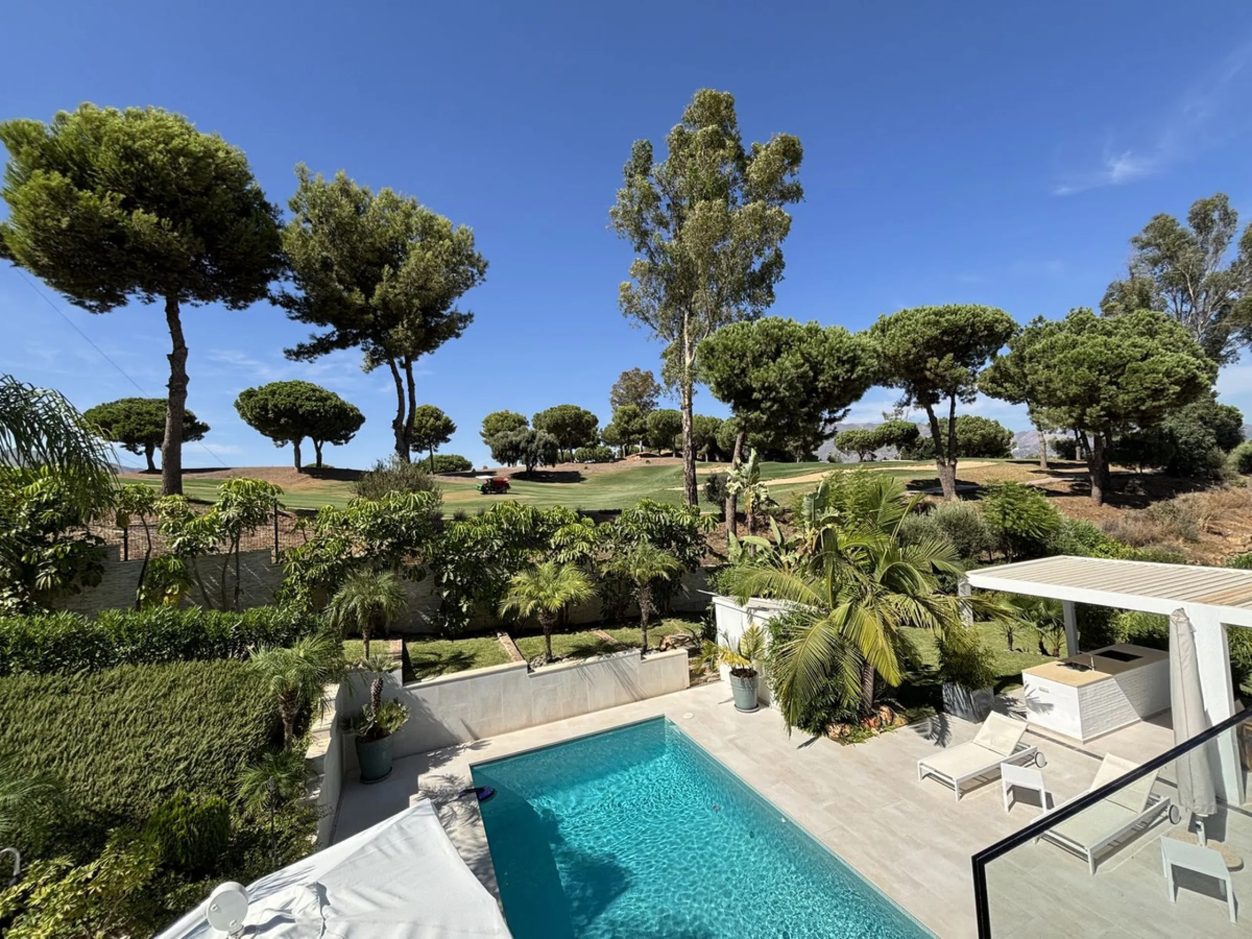 This stylish modern villa is located frontline to the golf course in the sought-after La Cala Golf Resort. With clean lines, large windows, and a sleek design, the property offers bright and open living spaces with stunning golf and mountain views and a r