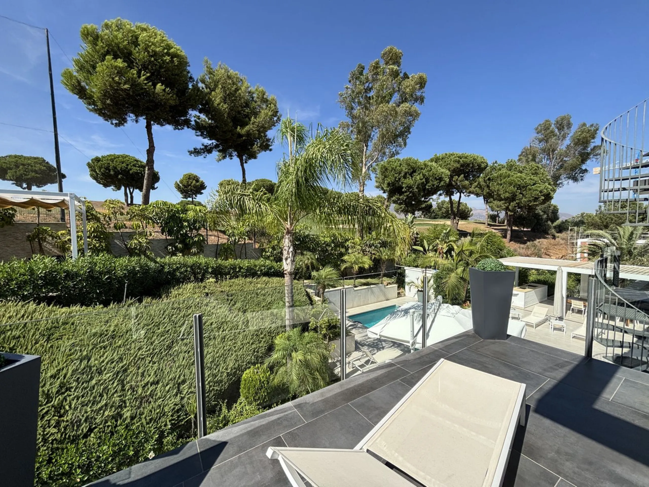 This stylish modern villa is located frontline to the golf course in the sought-after La Cala Golf Resort. With clean lines, large windows, and a sleek design, the property offers bright and open living spaces with stunning golf and mountain views and a r