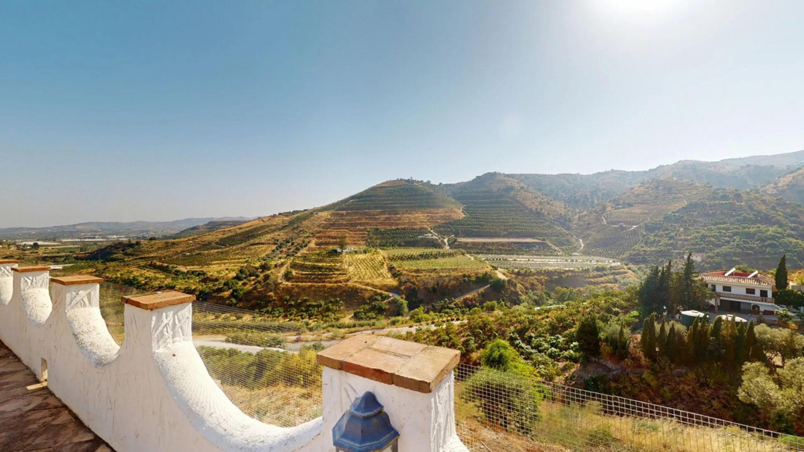 This delightful Spanish villa, located in Viñuela, Málaga, offers a perfect blend of traditional charm and modern comfort. The single-story property spans 167 m2 and features three bedrooms, including a spacious 13.9 m2 primary bedroom, and two bathrooms.