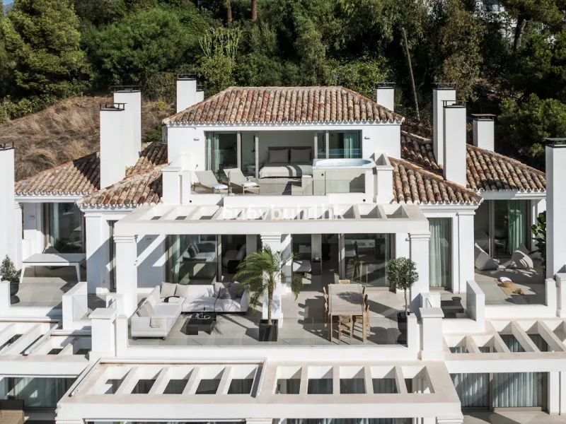 Located in the exclusive gated community of 9 Lions Residences above Puerto Banus, this corner duplex penthouse offers complete privacy, breathtaking sea views, and the feel of a private villa – without the maintenance.