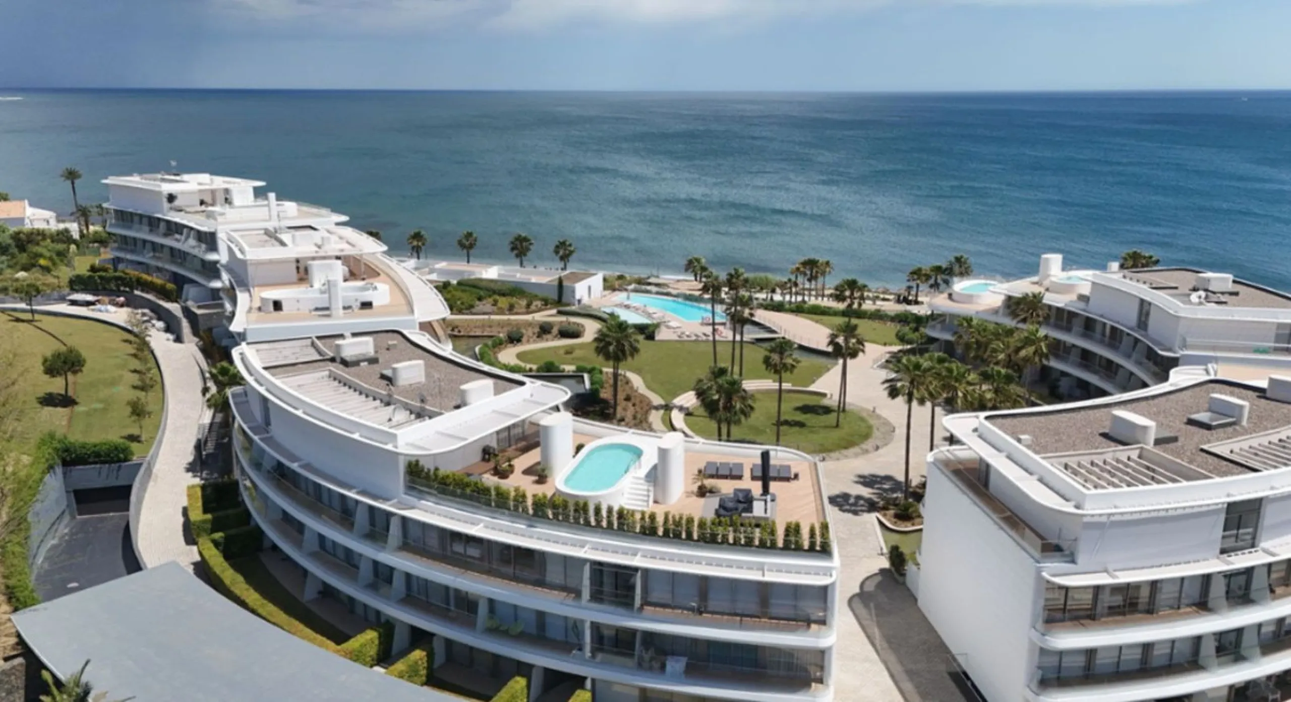 Welcome to this luxurious apartment located in the exclusive beachfront residential complex The Edge. This 2nd floor home offers four bedrooms and two bathrooms with exclusive Dornbracht finishes. The open concept living room and kitchen create a social a